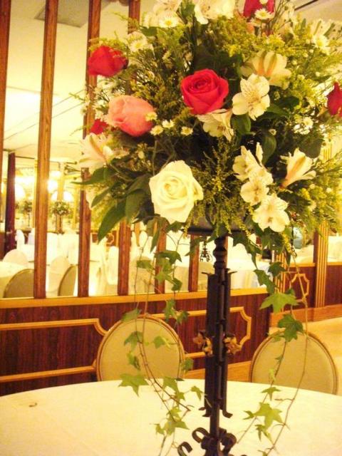 Floral wedding center pieces for tables picture.jpg
