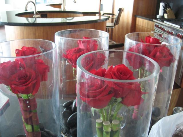 home made wedding center pieces with red roses.jpg