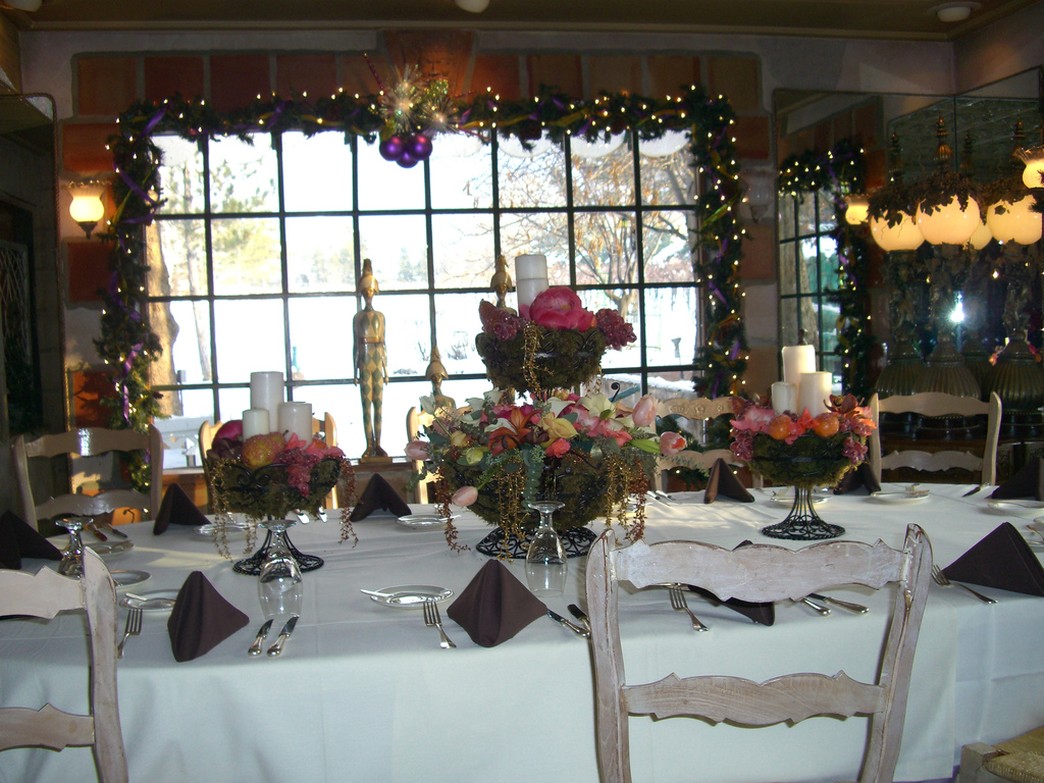 spring wedding center pieces with white candles.jpg