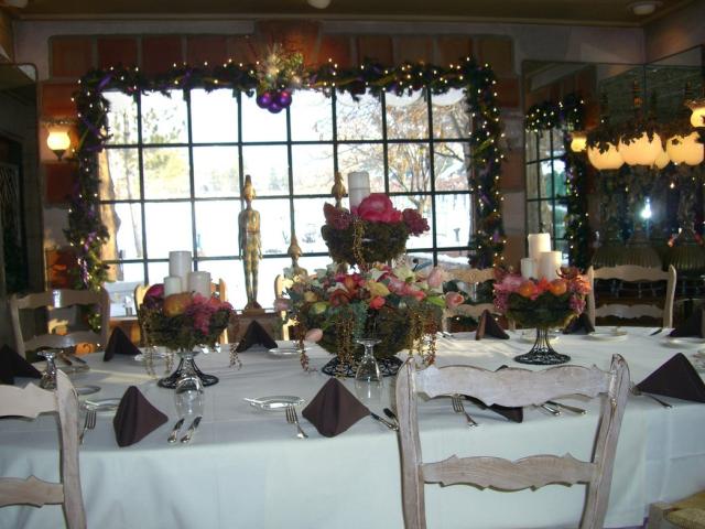 spring wedding center pieces with white candles.jpg
