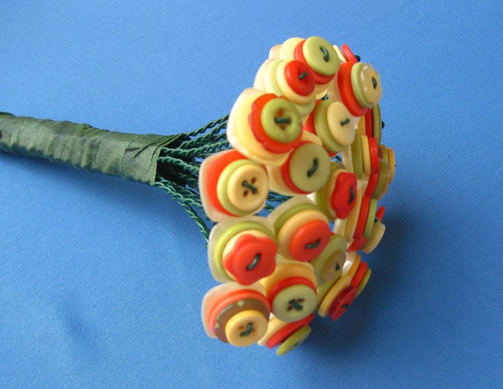 Citrus Flowergirl Bouquet_very cool wedding bouquet with bottons.jpg