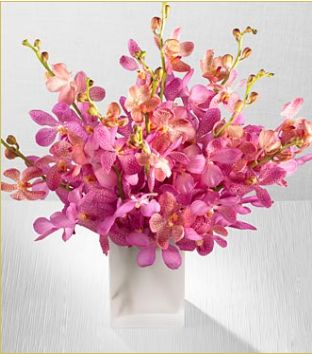 Pink Sapphire Orchids flowers wedding center piece photo.JPG