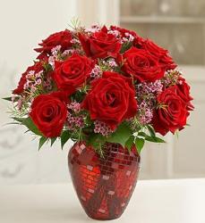 Photo of red roses arrangement with tiny pink flowers with crystal red vase with interesting patterns.JPG