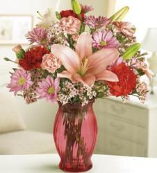 Red and pink passion arrangement in red vase image.JPG