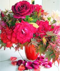 Bright red and pink flowers arrangement photo.JPG